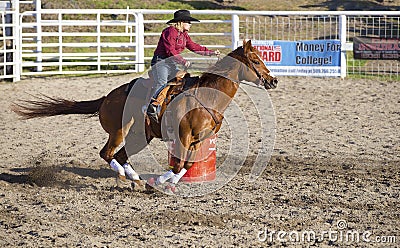 Rodeo barrel riding competition Editorial Stock Photo