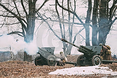 Reenactors Dressed As Russian Soviet Red Army Soldiers Of World War II Standing In Row. Editorial Stock Photo