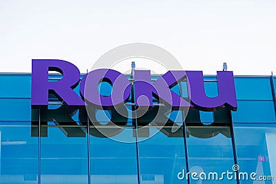 Roku sign and logo on the modern facade of consumer electronics and broadcast media company headquarters in Silicon Valley Editorial Stock Photo