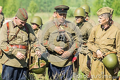 A role - play reconstruction of one of the battles of World war 2 on the outskirts of Moscow in the Kaluga region in Russia. Editorial Stock Photo