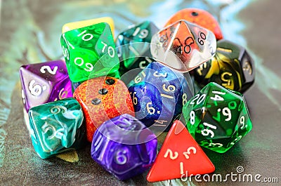 Role playing dices lying on picture background Stock Photo