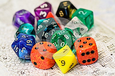 Role playing dices lying on sketch map Stock Photo
