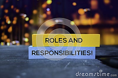 Roles and Responsibilities! on the sticky notes with bokeh background Stock Photo