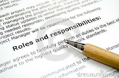 Roles and responsibilities with wooden pen Stock Photo