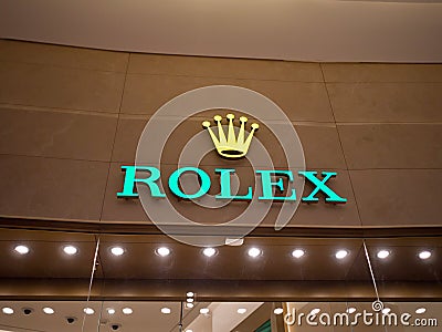 Rolex logo close up from a shop in mall Editorial Stock Photo