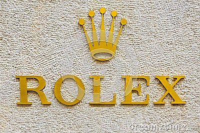 Rolex logo in an exclusive area of Milan, Italy Editorial Stock Photo