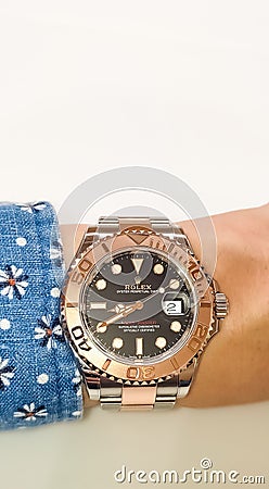 Rolex Yacht-master with rose gold bezel and two tone strap wear in Bangkok, Thailand Editorial Stock Photo