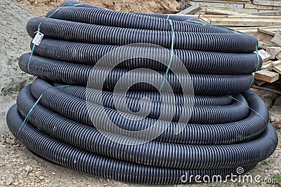 Roll of black flexible conduit nylon pipe Stock Photo