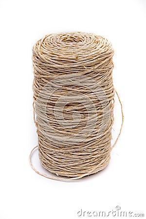 A roll or coil of natural rope or jute twine on white background Stock Photo