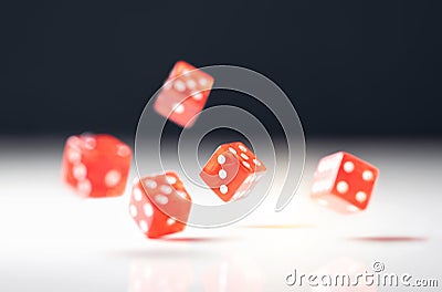 Roll the dice. Risk, luck, gambling, betting or addiction concept. Throwing five red casino and poker dice on table. Stock Photo