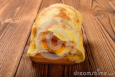 Roll with egg and shredded pork and barbeque pork with some bites close up Stock Photo