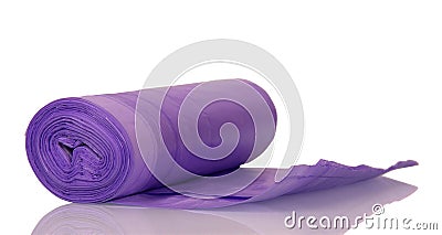 A roll of lilac polyethylene garbage bags isolated on white. Stock Photo
