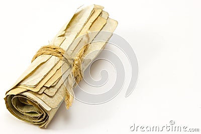 Roll of money tied with a rope Stock Photo
