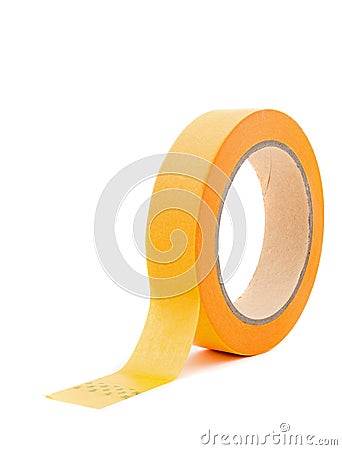A roll of painter`s yellow masking tape Stock Photo