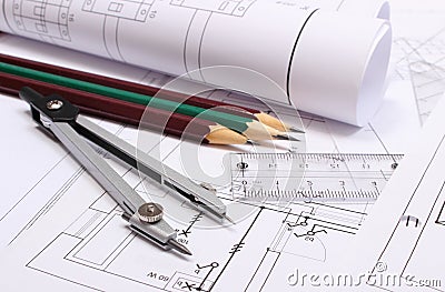 Rolled electrical diagrams and accessories for drawing Stock Photo