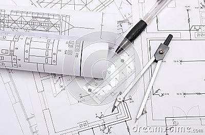 Rolled electrical diagrams and accessories for drawing Stock Photo