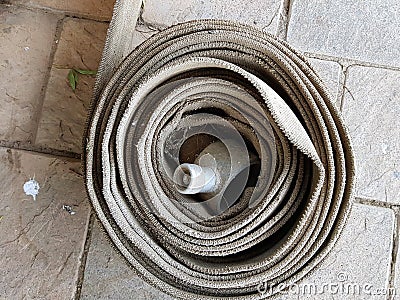 Rolled hose pipe Stock Photo