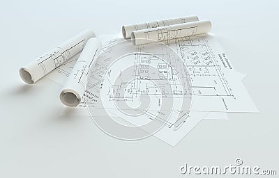 Rolled House Blueprints On Gray Background Stock Photo
