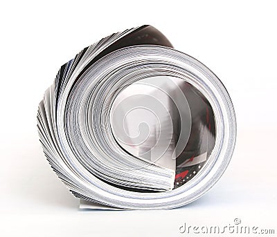 Rolled magazine Stock Photo