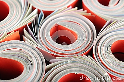 Rolled magazine Stock Photo