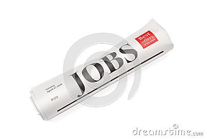 Rolled newspaper with headline JOBS on white background Stock Photo