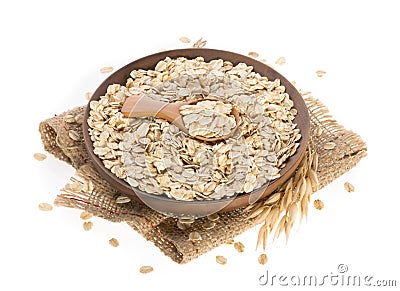 Rolled oats, healthy breakfast cereal oat flakes isolated on white Stock Photo