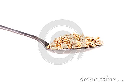 Rolled oats in spoon Stock Photo