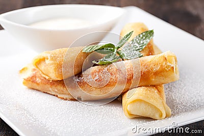 Rolled pancakes Stock Photo