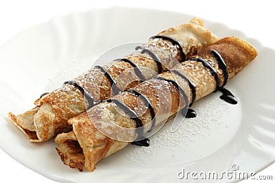 Rolled pancakes with chocolate Stock Photo