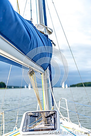 Rolled sail in the cover Stock Photo