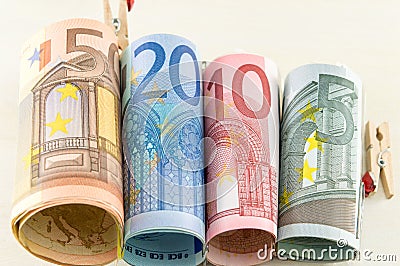 Rolled up euro bill monete Stock Photo