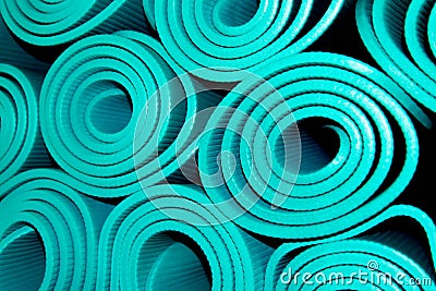 Rolled yoga mats Stock Photo