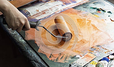 Roller for applying paint on printed form Stock Photo