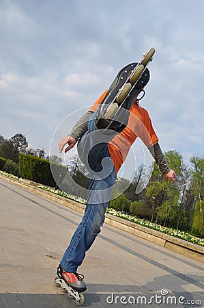 Roller boy jumping Stock Photo