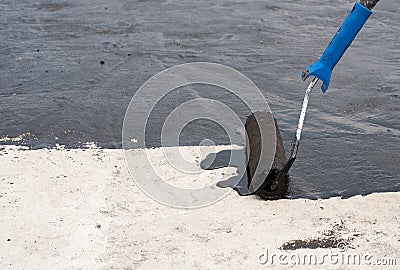 Roller brush waterproofing Stock Photo