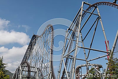 roller coaster against blue sky at Fuji-Q Highland, Yamanashi, Japan Stock Photo