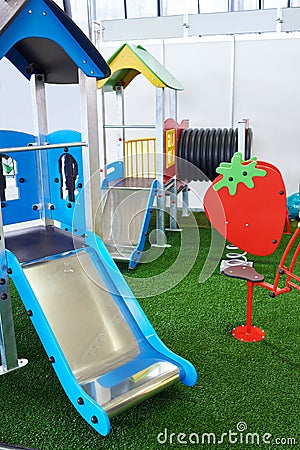 Roller coaster for children on playground indoors Stock Photo