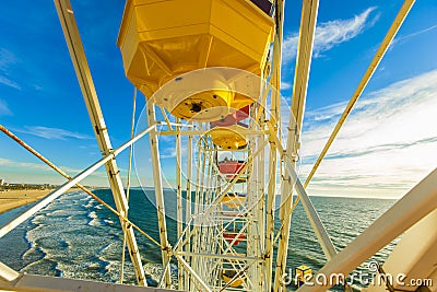 Roller Coaster and Ferris Wheel at Pacific Park on the Pier Editorial Stock Photo