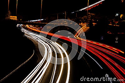 Roller coaster light trails on the highway in tenerife Stock Photo