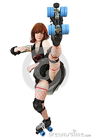 Roller derby girl kicking Stock Photo