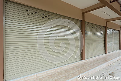 Roller shutter door in warehouse building Stock Photo