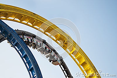 Rollercoaster looping ride on fun fair Stock Photo