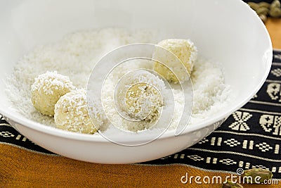 Rolling Burfi In Coconut Stock Photo