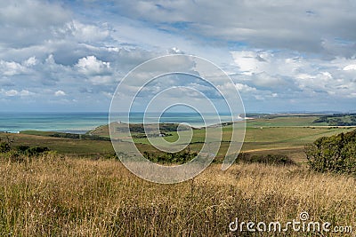 The rolling hills and meadows of the Jurassic Coast on the English Channel coast of East Sussex Stock Photo
