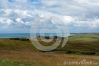 The rolling hills and meadows of the Jurassic Coast on the English Channel coast of East Sussex Stock Photo