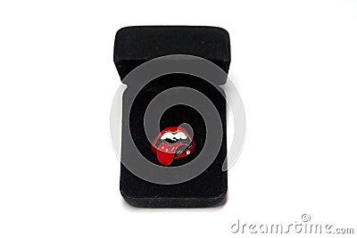 A rolling stones ring in a black box Stock Photo