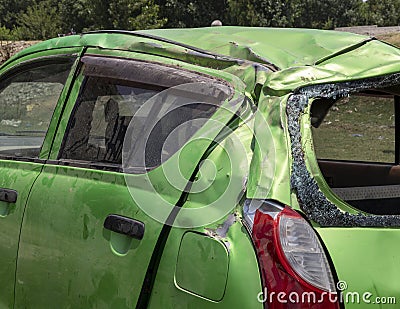 Rollover horrific traffic accident severely damaged the car Stock Photo