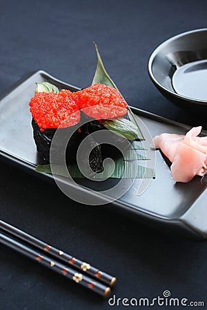 Rolls of Ikura gunkan maki sushi. Stock Photo