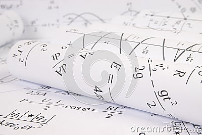 Rolls of paper printed drawings with mathematical electrical formulas Stock Photo