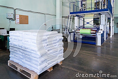 Rolls of polyethylene or polypropylene film in a warehouse Stock Photo